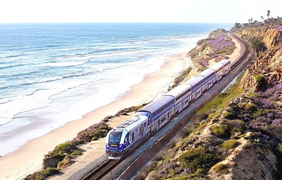 Passenger train following the Pacific coastline